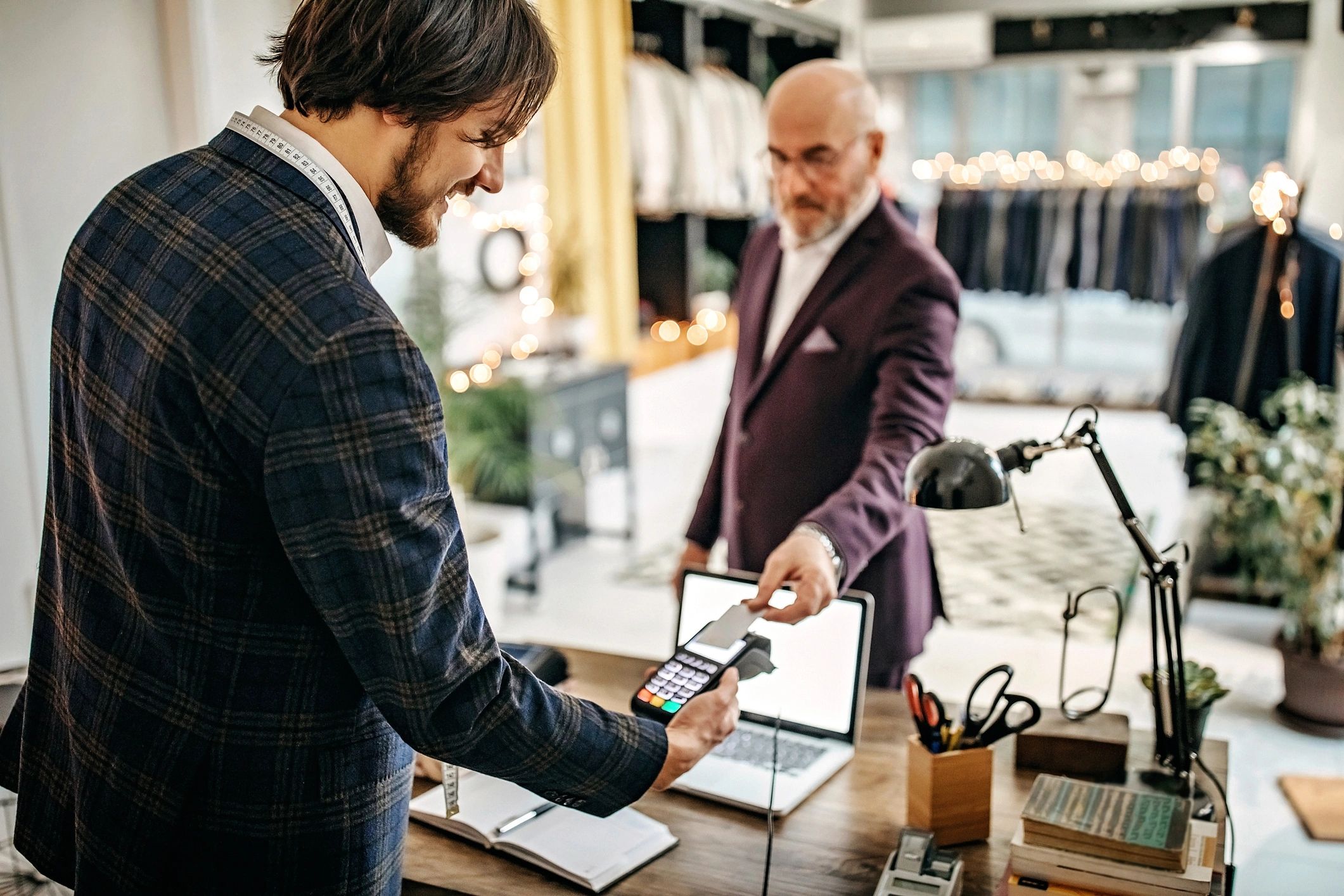 Customer paying with a card at a store