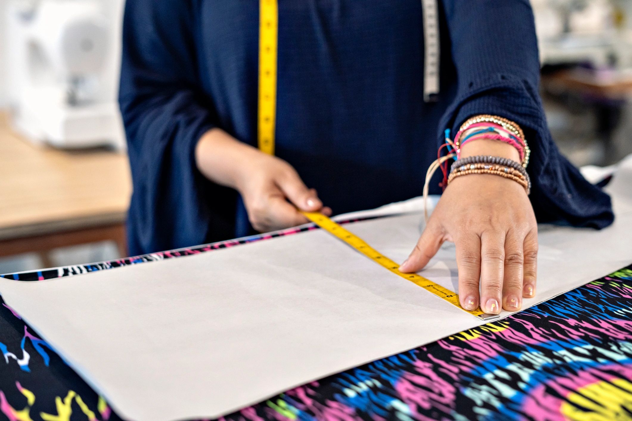 Measuring a sewing pattern on fabric