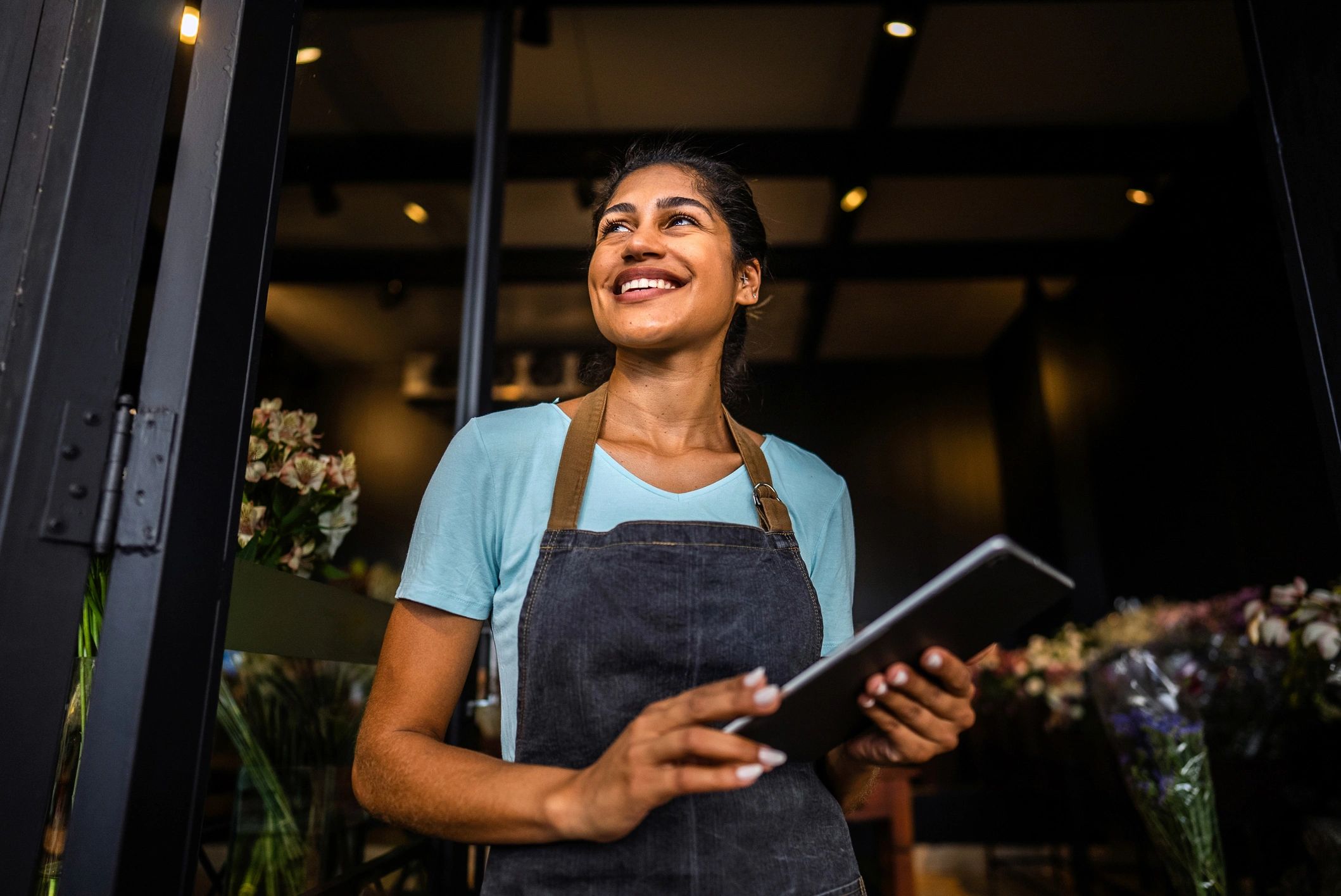 Small business owner reading and evaluating information, representing software research